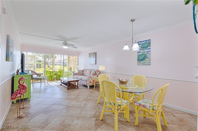 dining area featuring ceiling fan with notable chandelier and crown molding