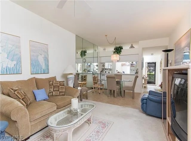 living room featuring ceiling fan