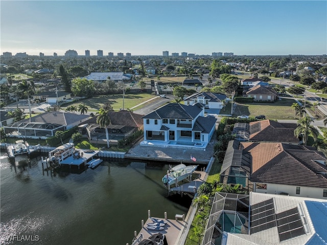 drone / aerial view with a water view