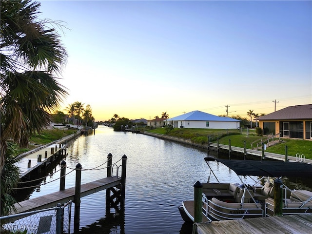 view of dock with a water view