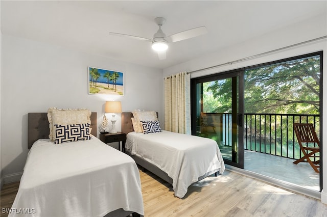 bedroom featuring wood-type flooring, access to outside, and ceiling fan