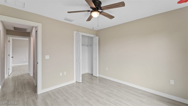 unfurnished bedroom featuring ceiling fan and light hardwood / wood-style floors