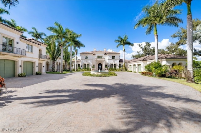 mediterranean / spanish-style house featuring a balcony