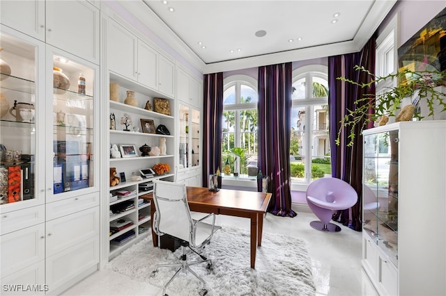 home office with a wealth of natural light and ornamental molding