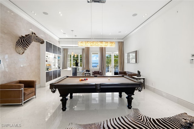 recreation room featuring pool table and ornamental molding