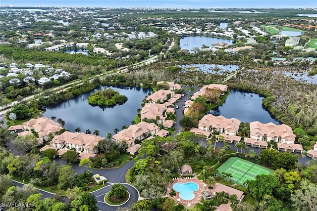 birds eye view of property featuring a water view