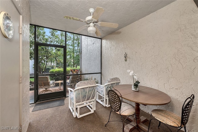 sunroom / solarium with ceiling fan