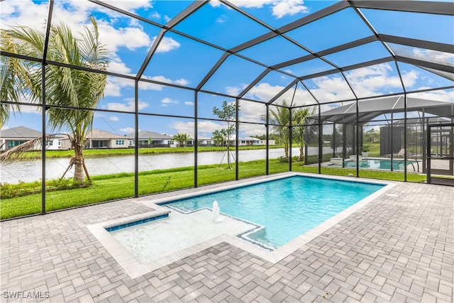 view of swimming pool featuring glass enclosure, a yard, a water view, and a patio