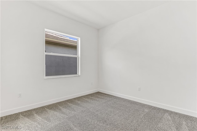 unfurnished room featuring carpet floors