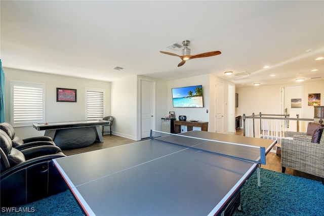 game room featuring ceiling fan and light wood-type flooring