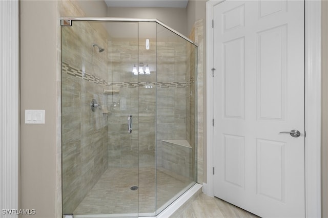 bathroom with an enclosed shower