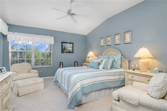 bedroom with light carpet, ceiling fan, and lofted ceiling