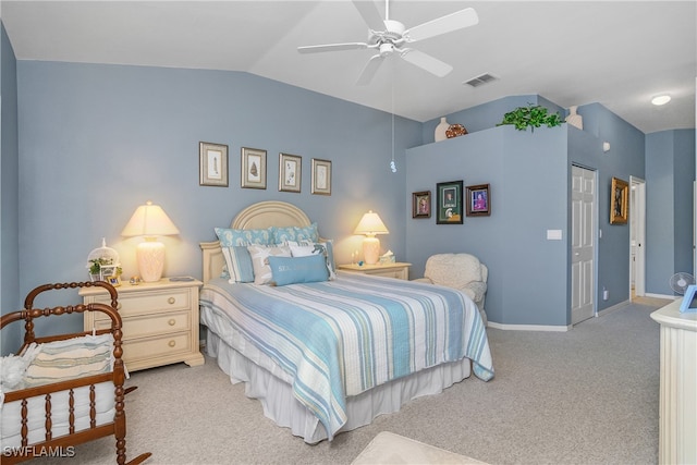 carpeted bedroom with a closet, ceiling fan, and lofted ceiling