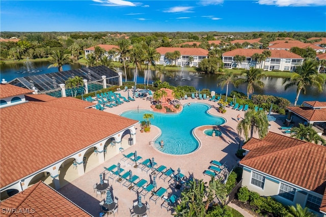 view of pool featuring a water view