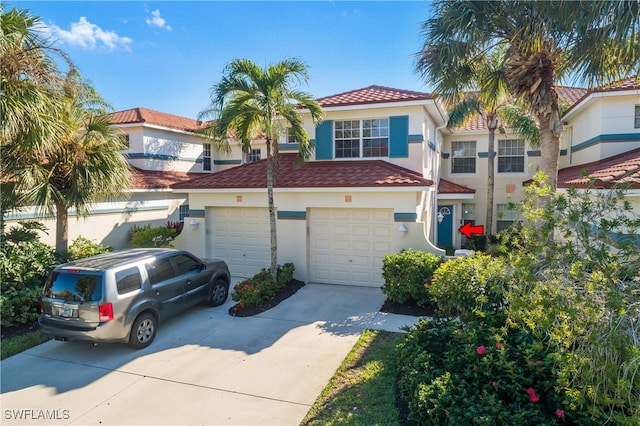 view of front of property with a garage