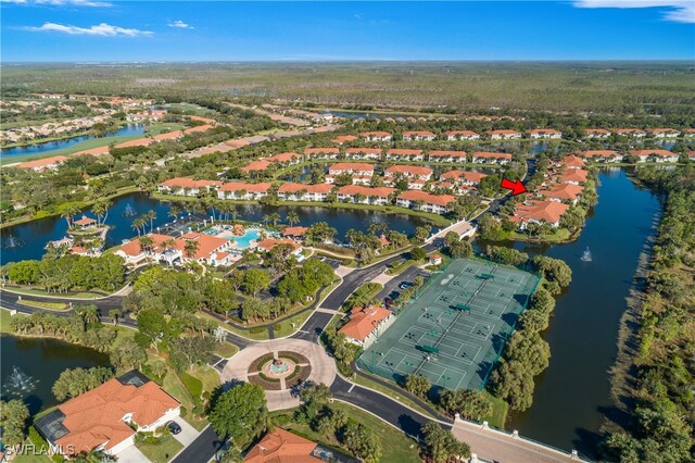 bird's eye view with a water view