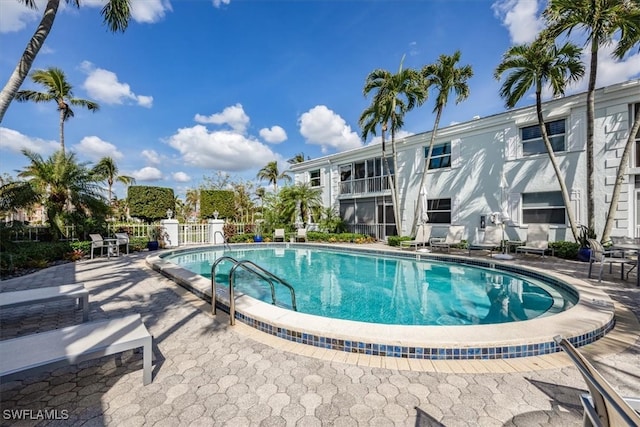 view of pool with a patio area