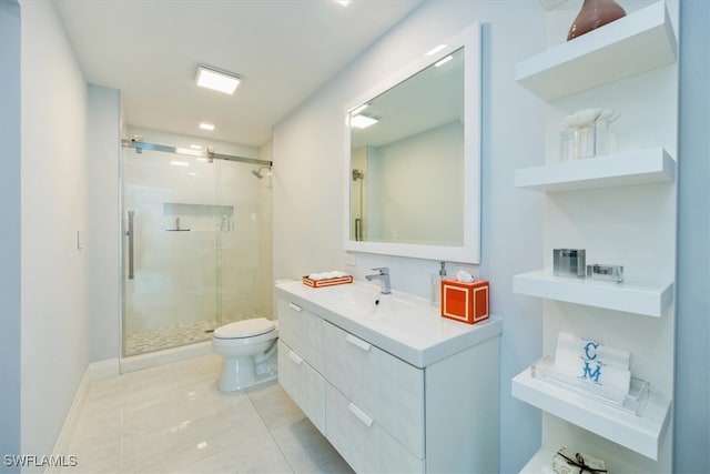 bathroom with tile patterned flooring, vanity, toilet, and a shower with shower door