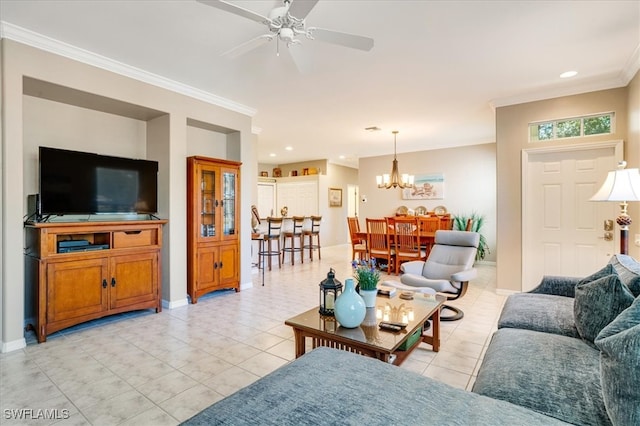 tiled living room with ceiling fan with notable chandelier and ornamental molding