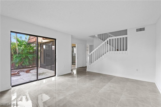 5260 Cedarbend Dr SW Unit 4, Fort Myers, FL 33919 - empty room featuring stairs and marble tiled floors
