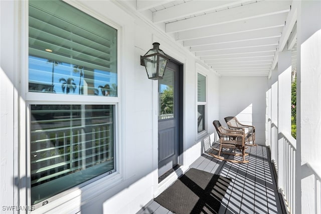 balcony featuring covered porch