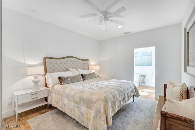 bedroom featuring ceiling fan and wood-type flooring