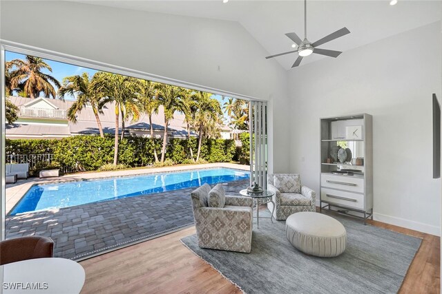 view of swimming pool with ceiling fan