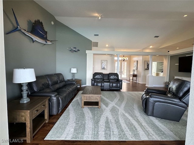 living room with dark hardwood / wood-style flooring