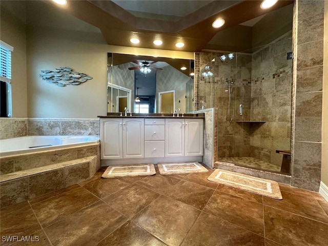 bathroom with shower with separate bathtub, vanity, and ceiling fan