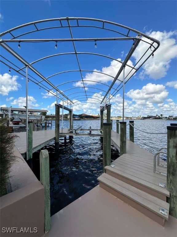 dock area featuring a water view