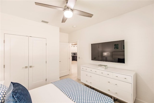 bedroom with a closet and ceiling fan