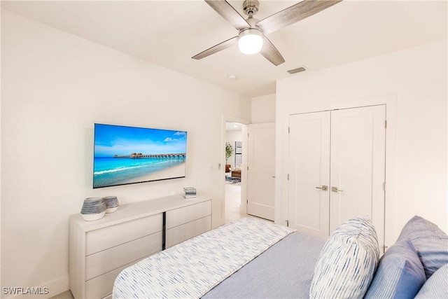 bedroom with carpet floors, a closet, and ceiling fan