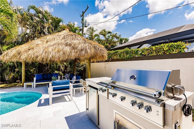 view of patio / terrace with an outdoor living space and area for grilling