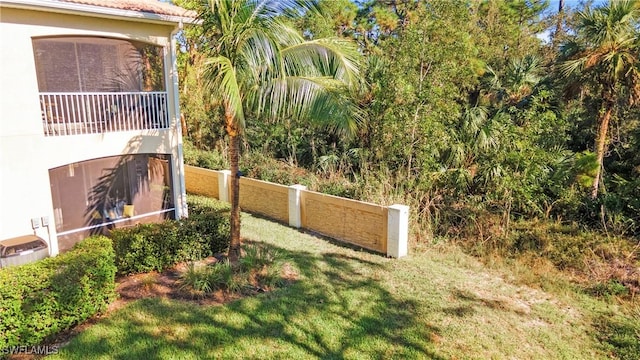 view of yard featuring fence