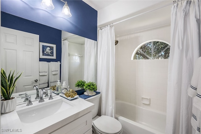 full bathroom with vanity, toilet, and shower / bathtub combination with curtain