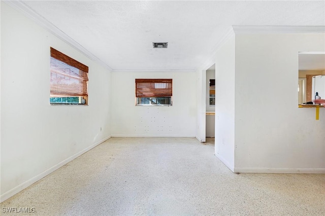 spare room featuring ornamental molding