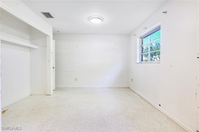 unfurnished bedroom featuring a closet