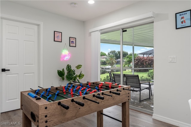 playroom with hardwood / wood-style floors