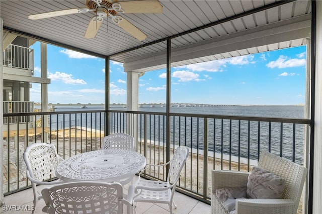 balcony featuring a water view