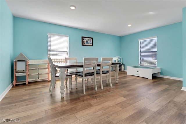 dining room featuring light wood-type flooring