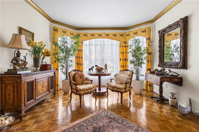 sitting room featuring parquet flooring and crown molding