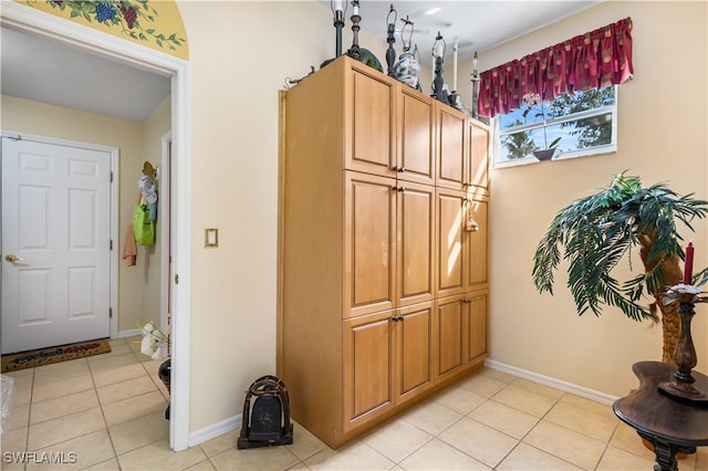 interior space featuring light tile patterned floors