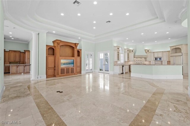 28790 Blaisdell Dr, Naples, FL 34119 - unfurnished living room featuring a tray ceiling, light marble finish floors, ornamental molding, ornate columns, and recessed lighting