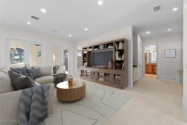 28790 Blaisdell Dr, Naples, FL 34119 - living room featuring french doors, recessed lighting, light colored carpet, and baseboards
