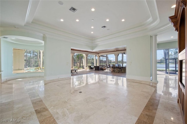 28790 Blaisdell Dr, Naples, FL 34119 - empty room with a tray ceiling, decorative columns, crown molding, plenty of natural light, and recessed lighting