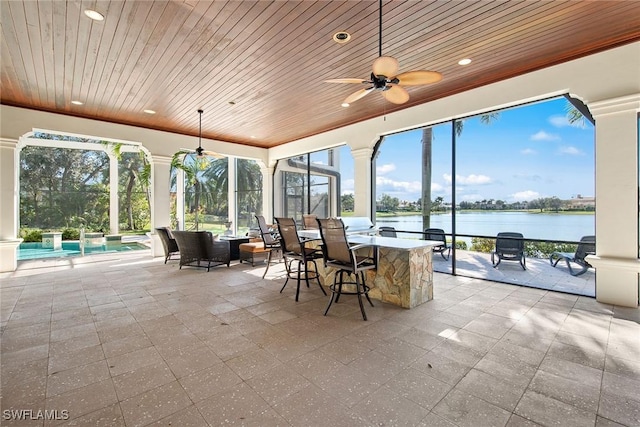 28790 Blaisdell Dr, Naples, FL 34119 - sunroom featuring a water view