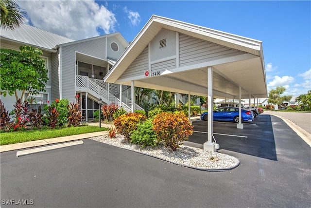 view of parking featuring a carport