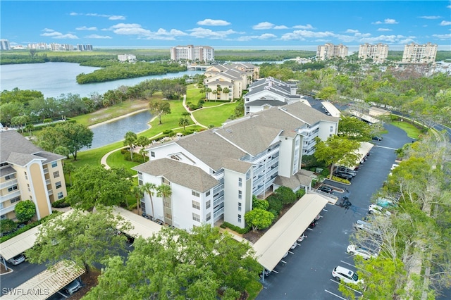 drone / aerial view with a water view