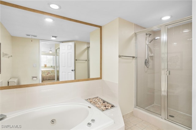 bathroom featuring tile patterned floors and independent shower and bath