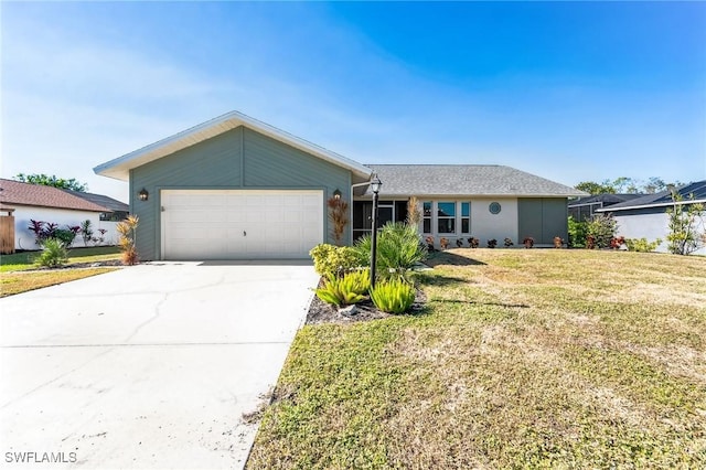 single story home with a front yard and a garage